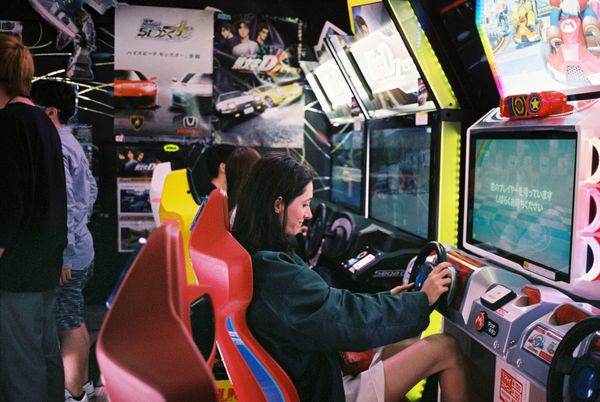 Girl racing in arcade